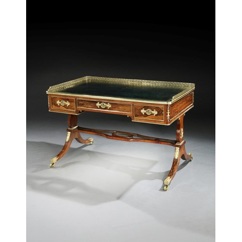 A REGENCY BRASS MOUNTED ROSEWOOD WRITING TABLE